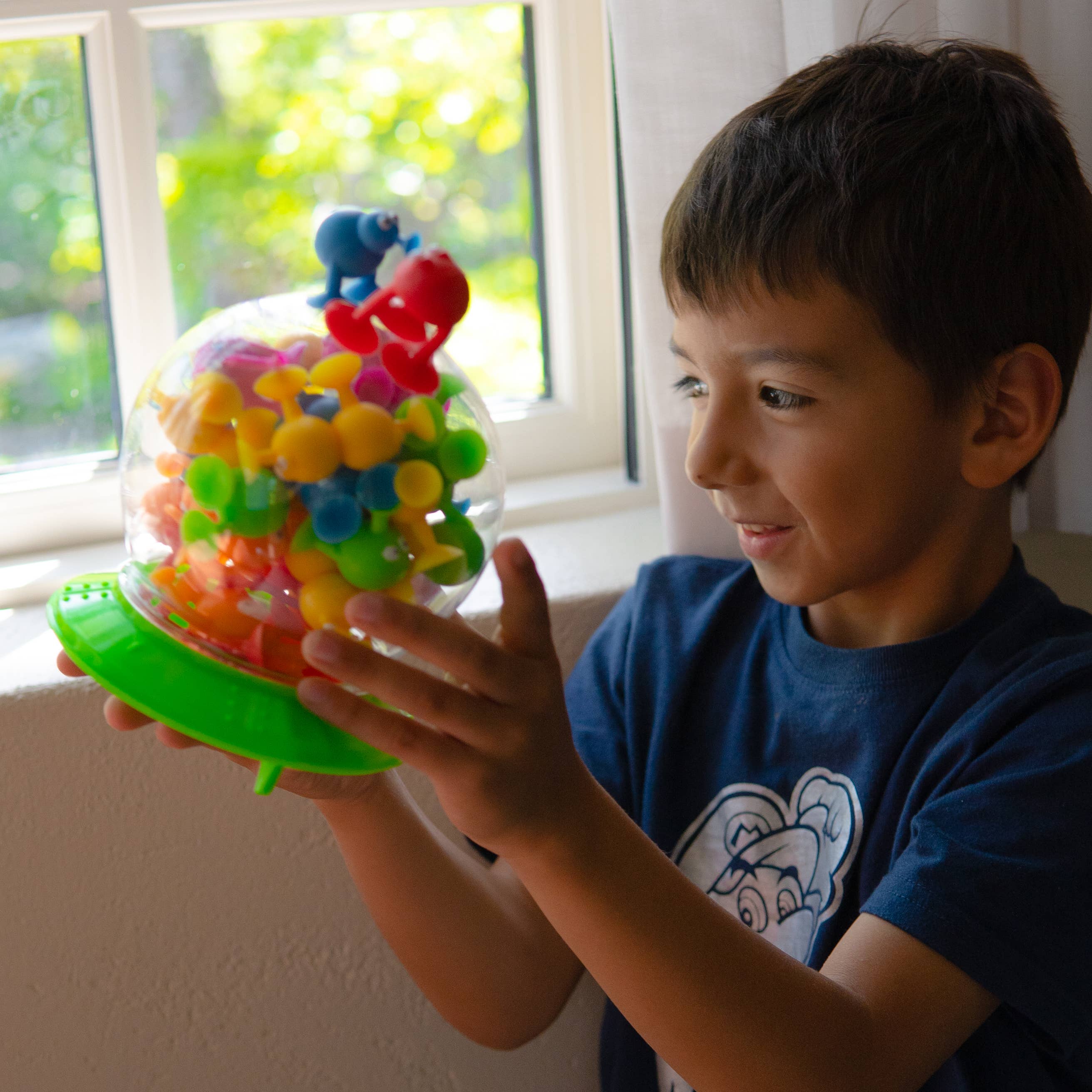 Poplings suction cup toy characters in play