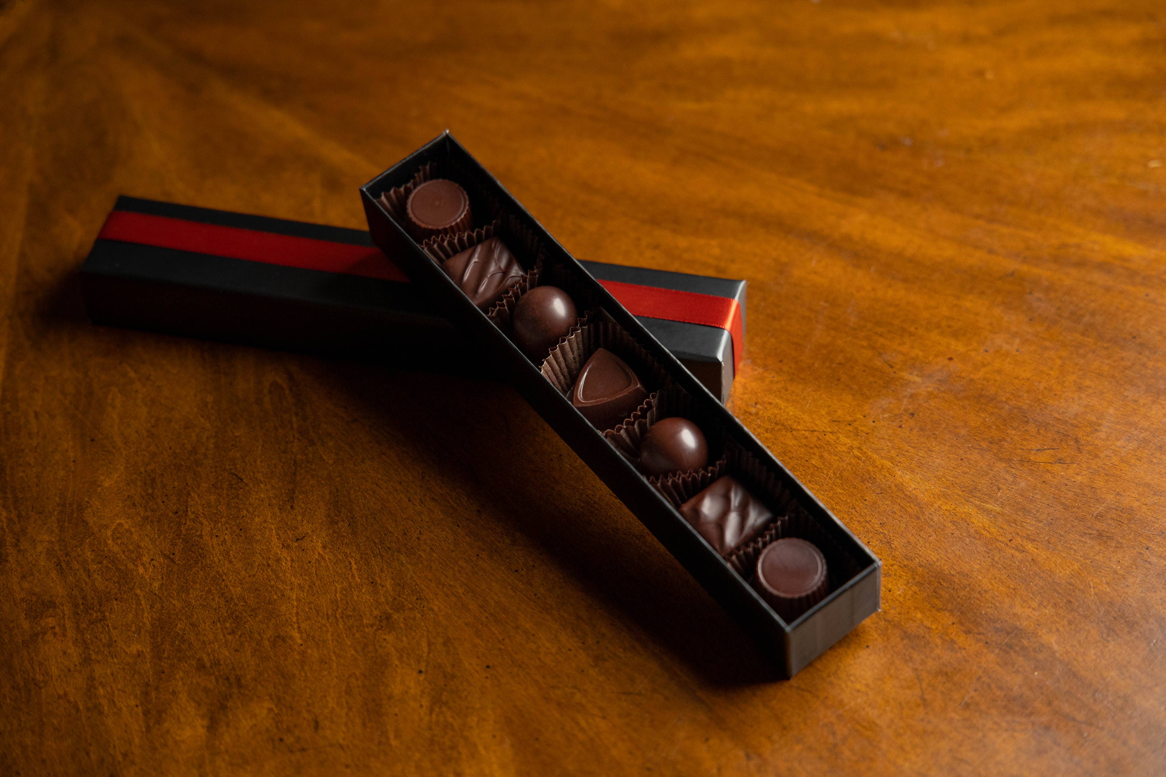 7-piece craft chocolate truffle box open showing truffles