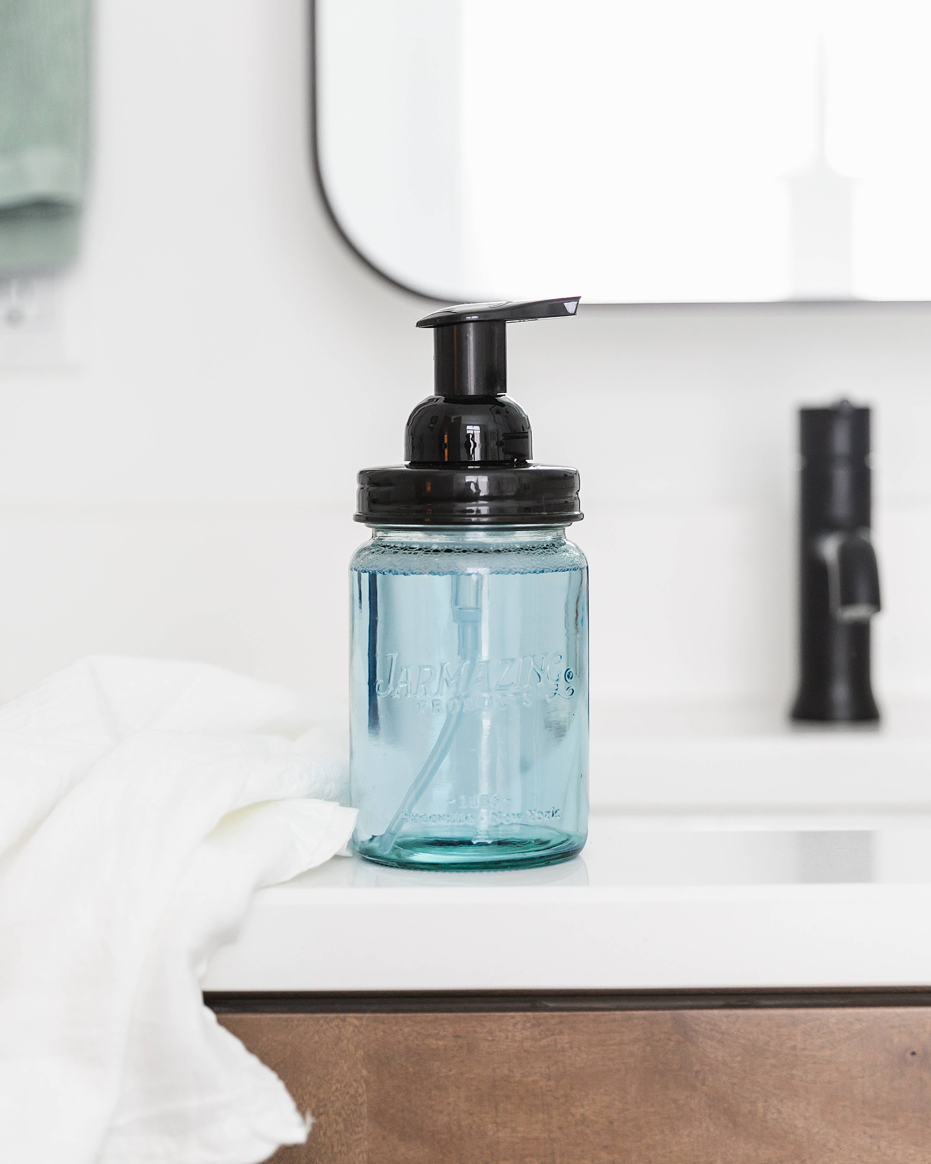 Blue glass mason jar foaming dispenser side view