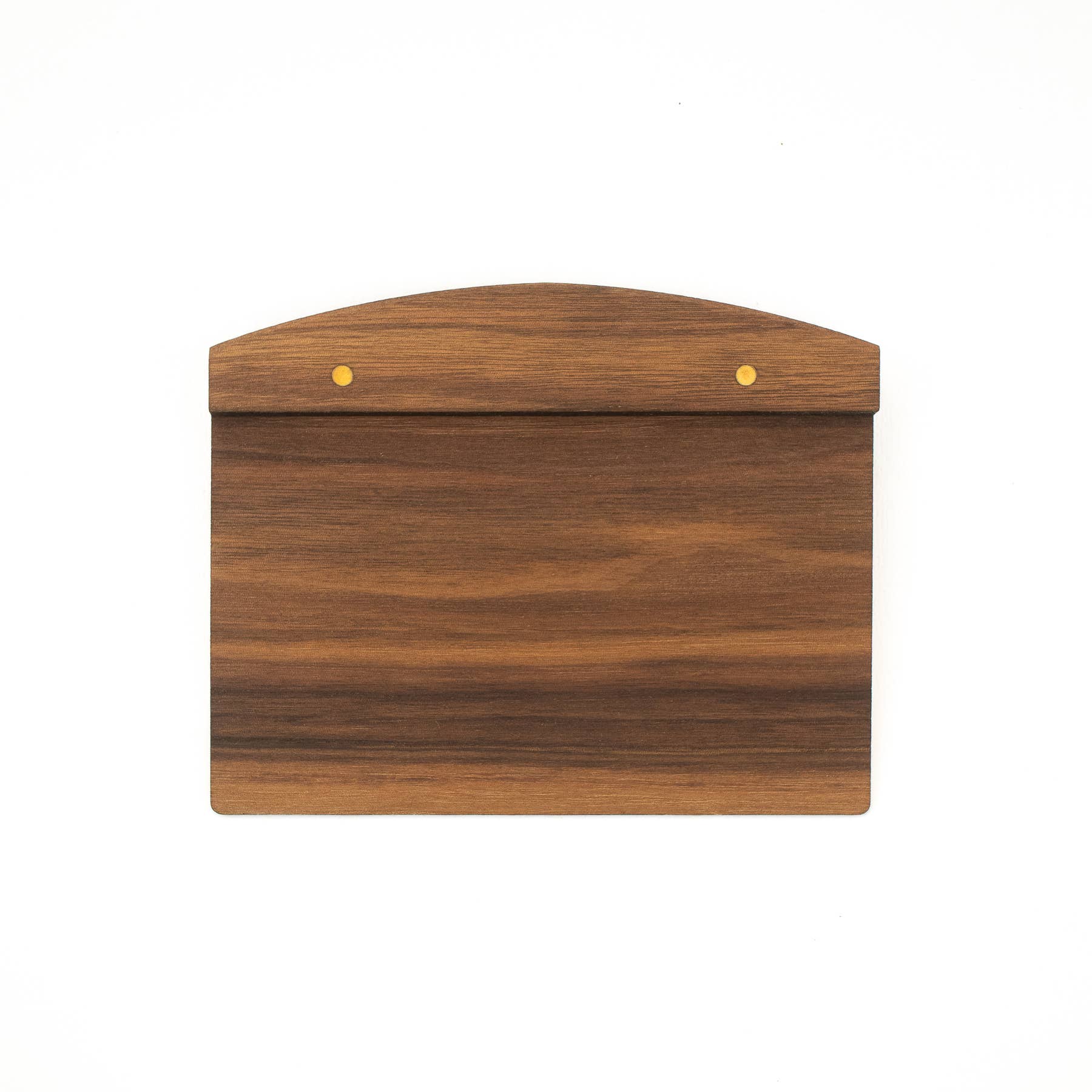 Walnut bench scraper in use on dough