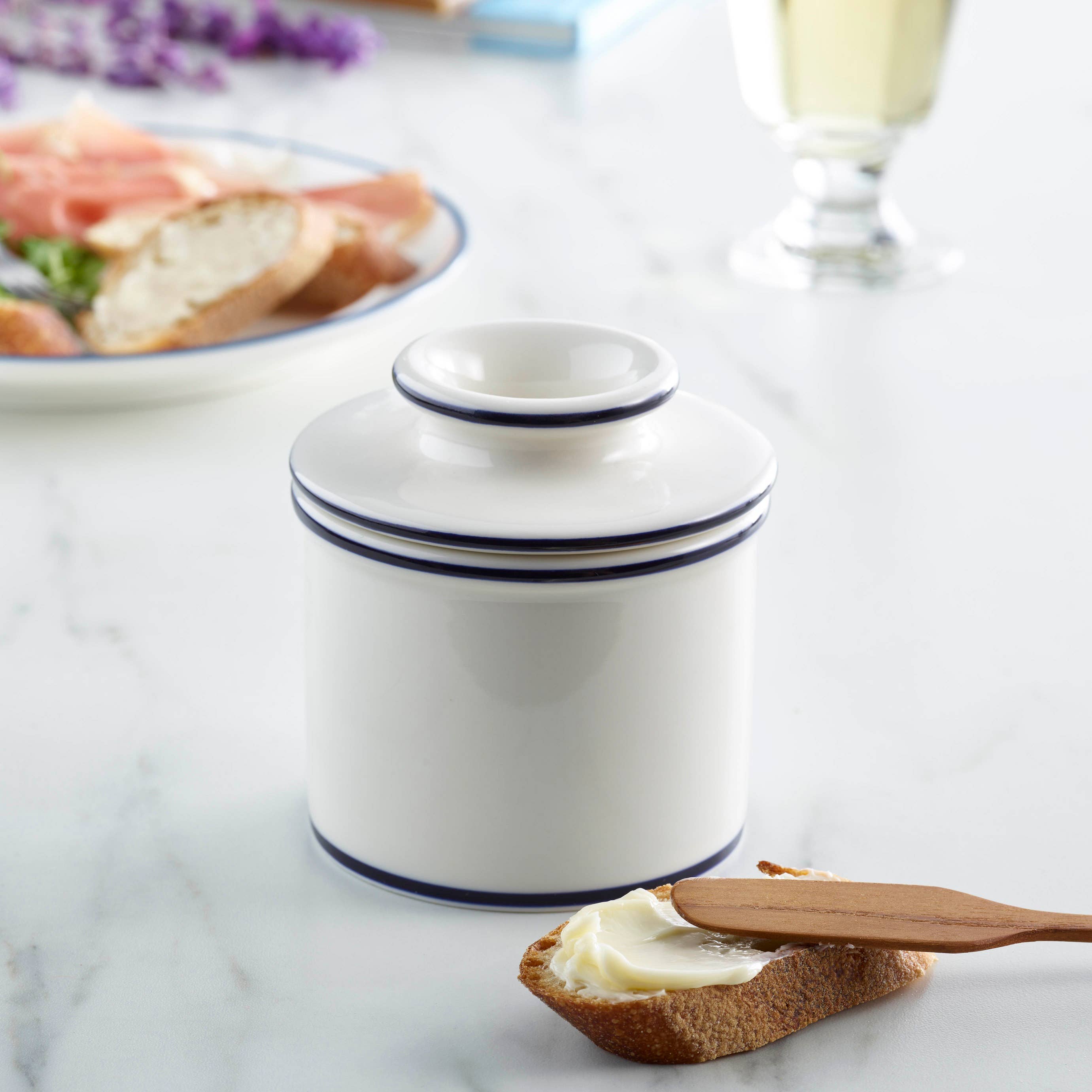 Le Bistro Butter Bell Crock in white with blue trim