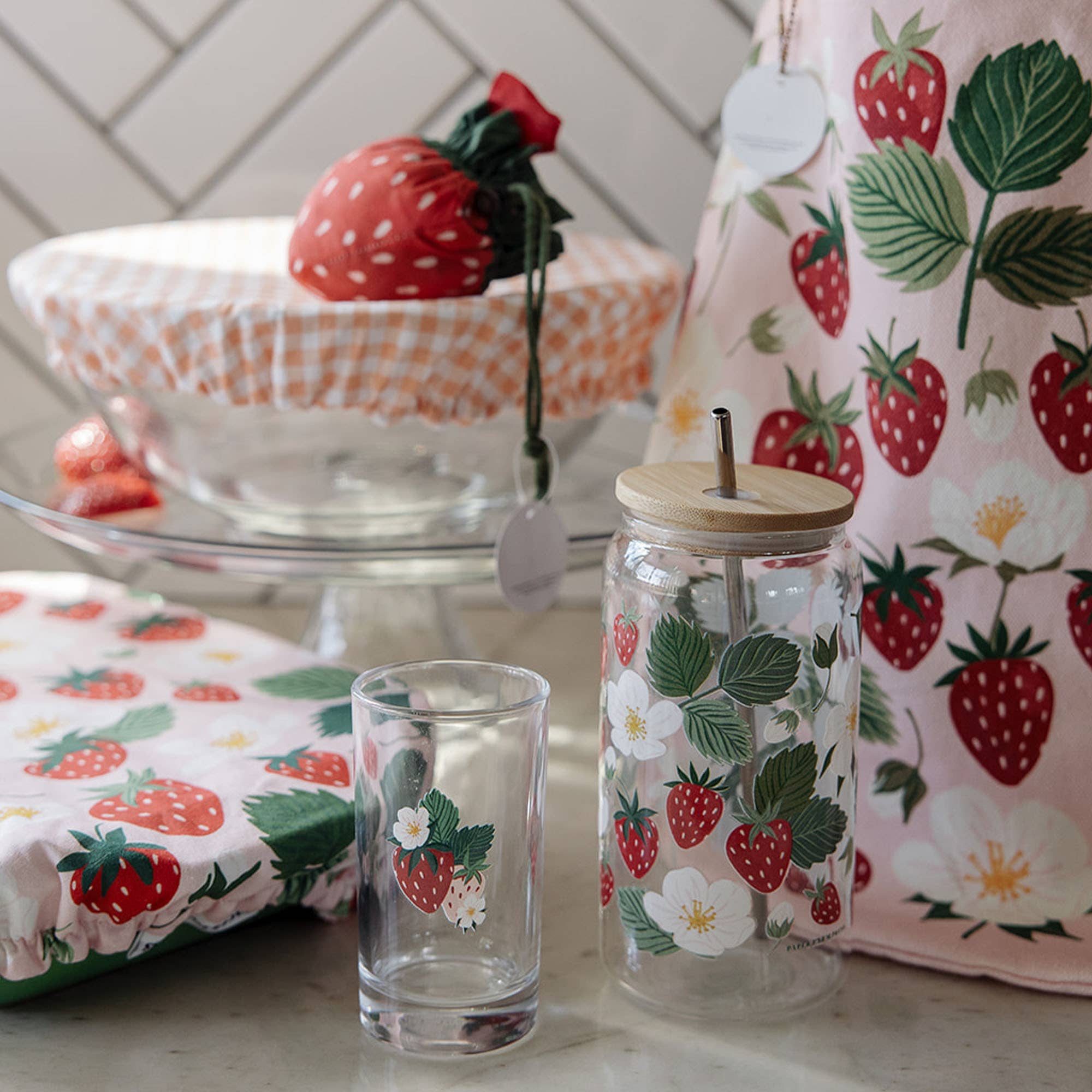 Strawberry Patch glass can with straw close-up