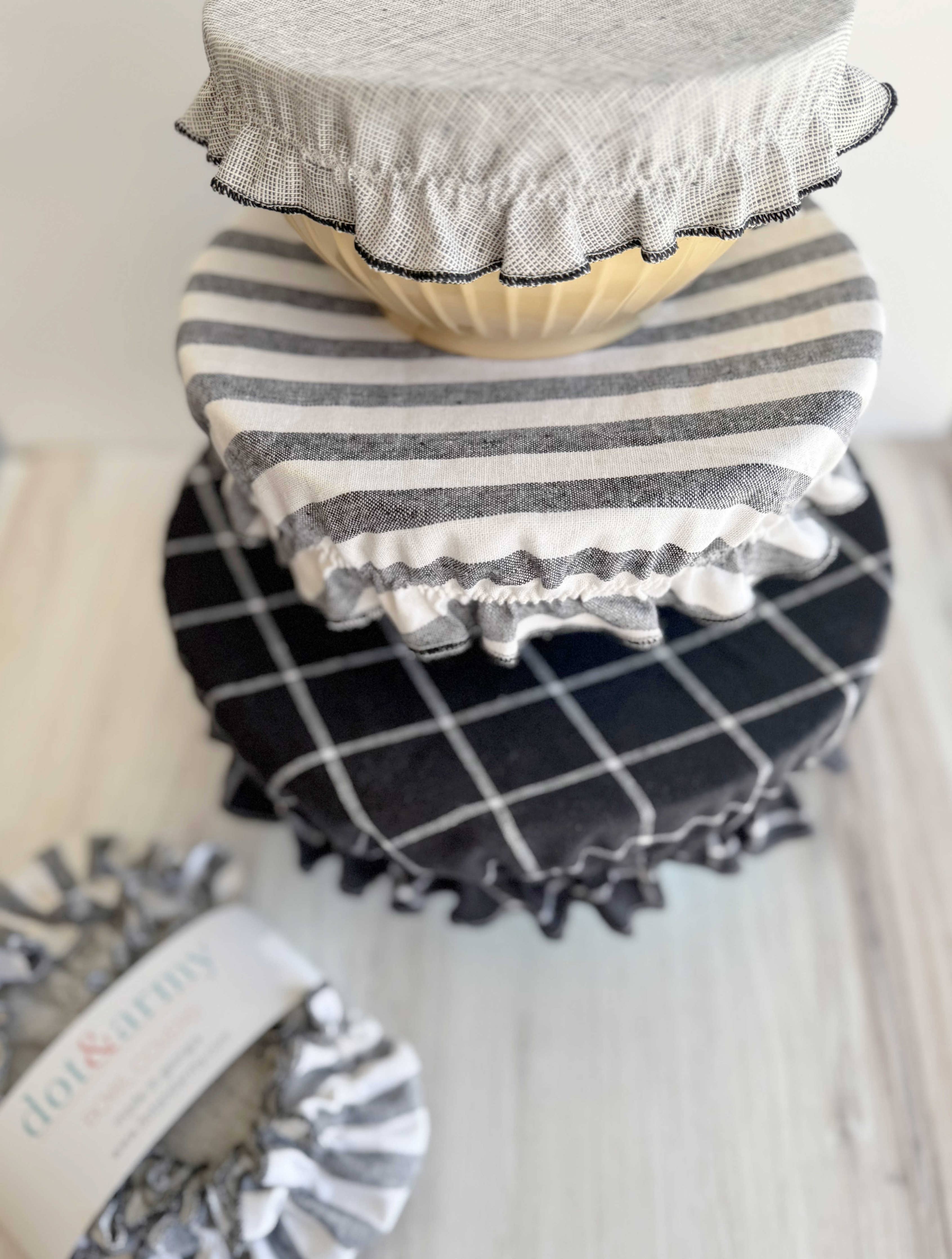Modern Farmhouse Noir bowl covers on bowls in kitchen