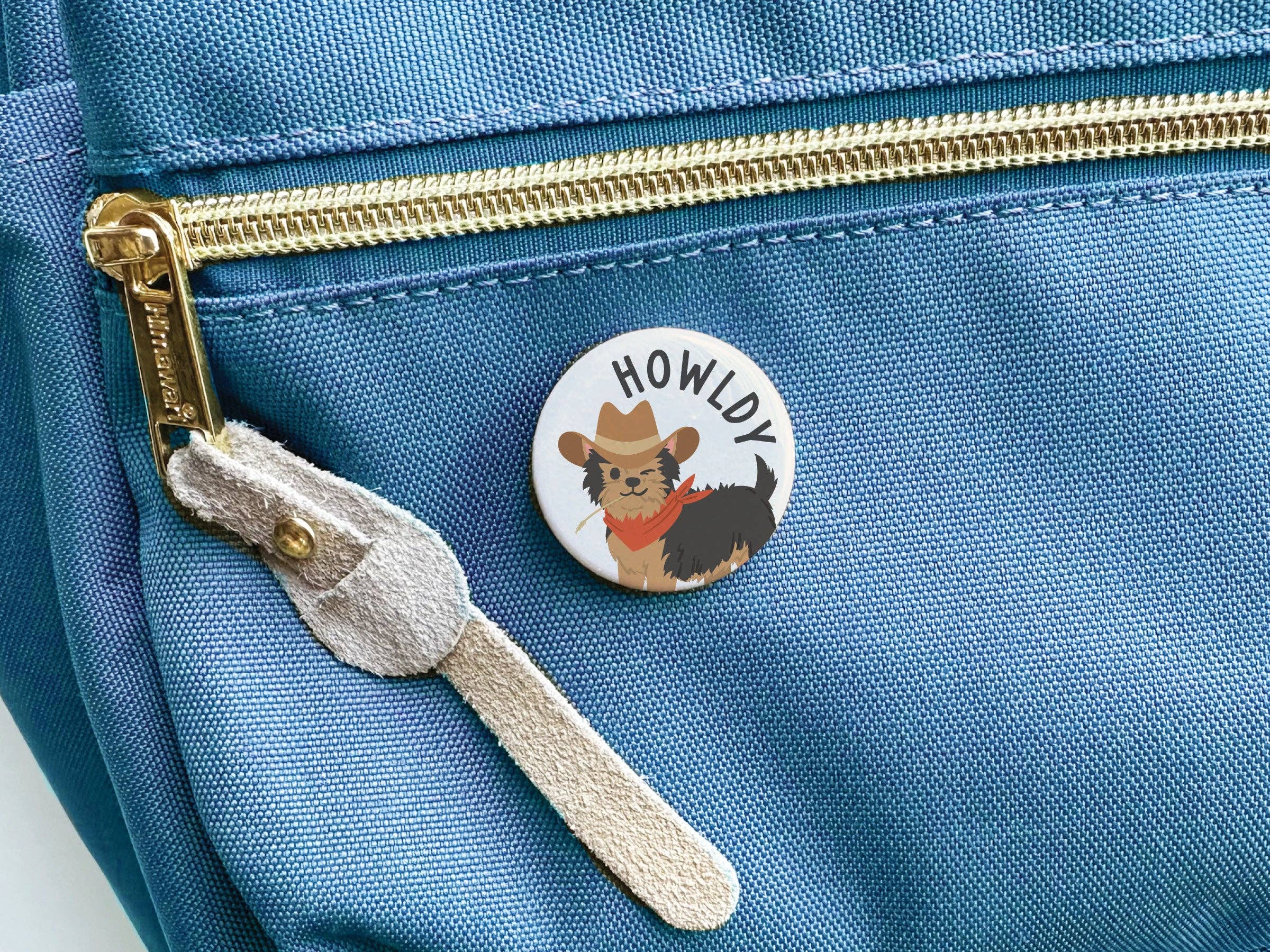 Howldy button displayed on packaging