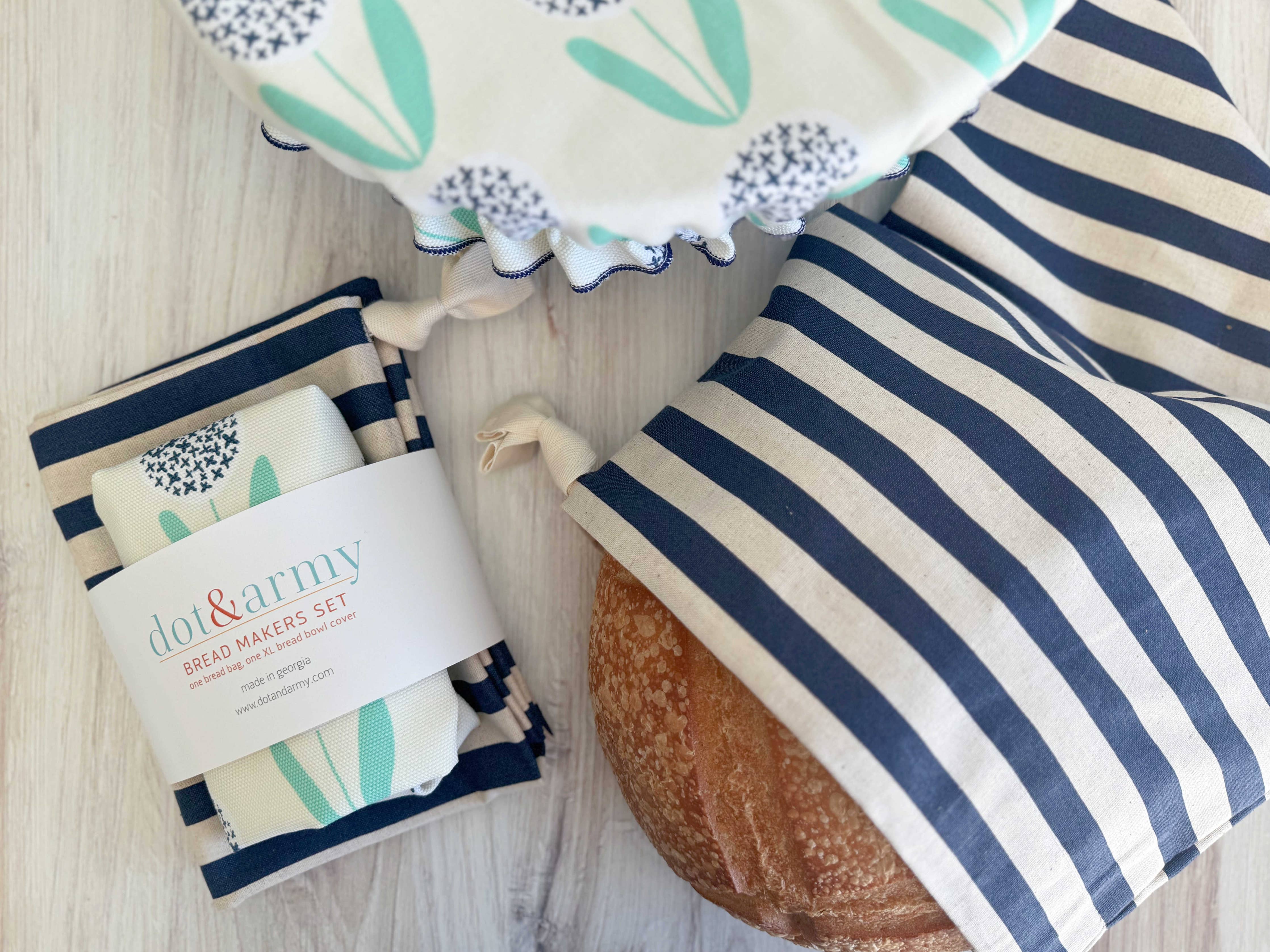 Dandelion Stripe Bread Makers Set styled with fresh bread