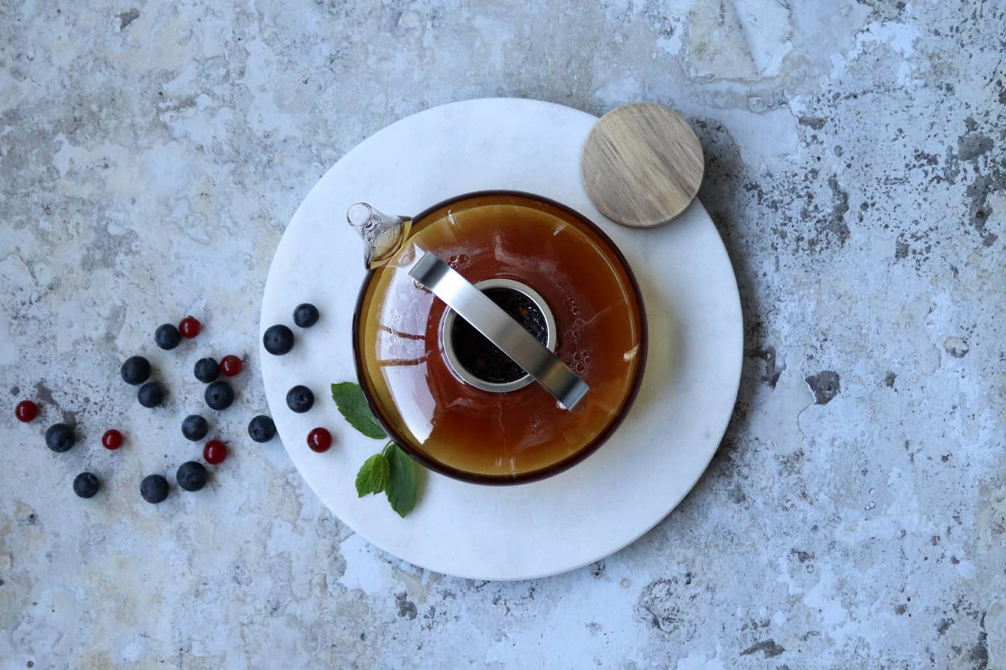 Sofia glass teapot with acacia lid side angle