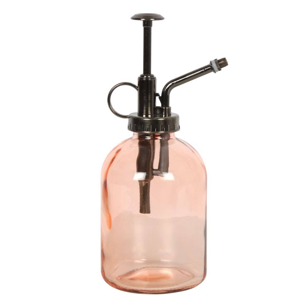 Pink minimalist glass plant mister spray nozzle close-up