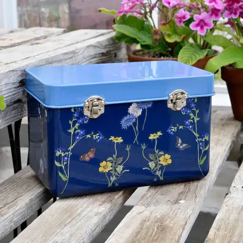 British Meadow Seed Tin styled with garden accessories