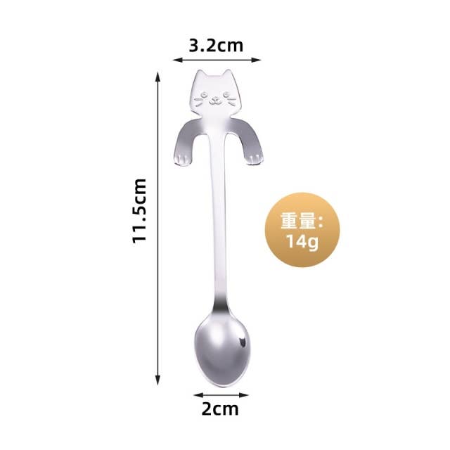 Cat spoon in use stirring a cup of tea