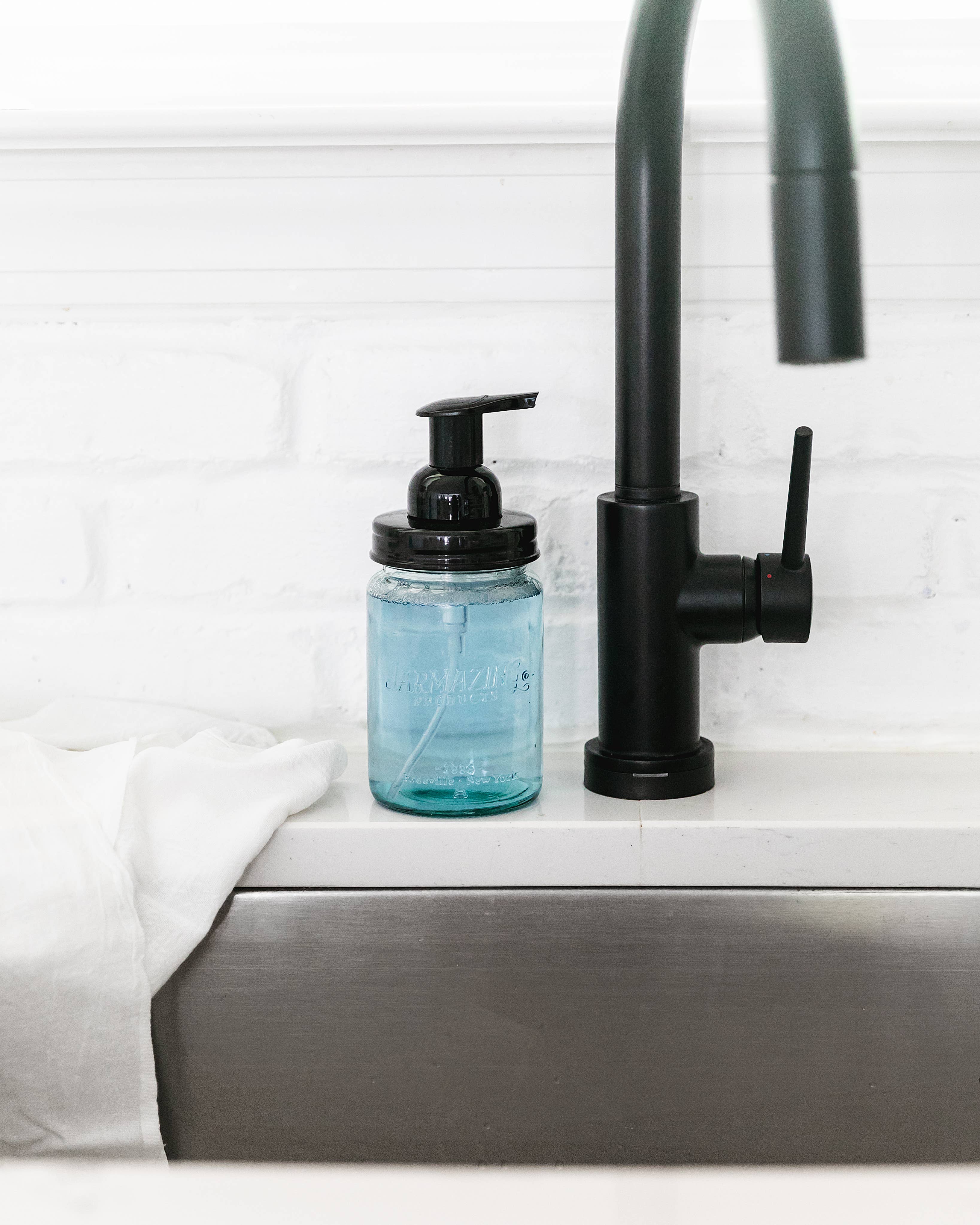 Blue glass mason jar foaming dispenser detail view