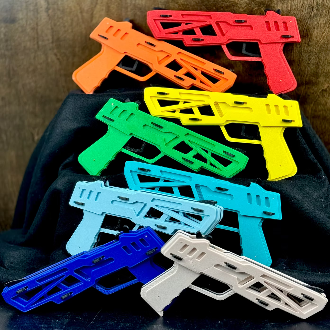 Wooden four-shot rubber band gun toy