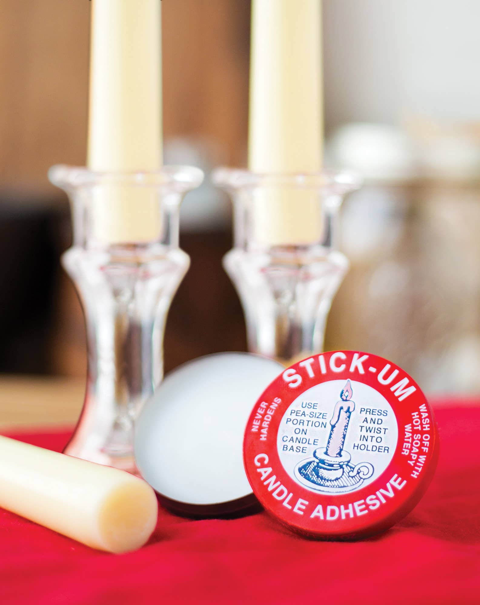 Stick-Um candle adhesive tube close-up