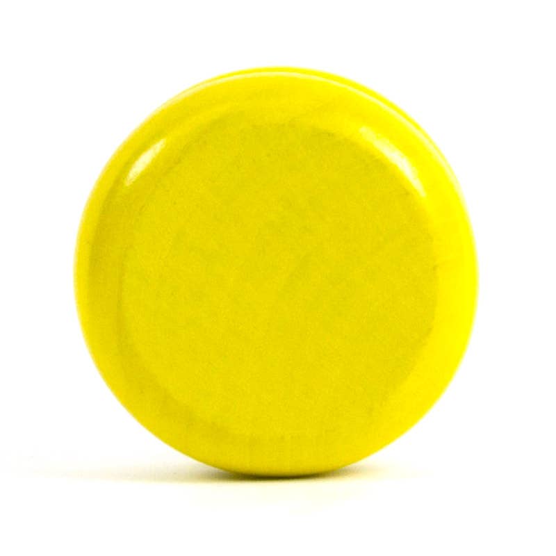 Classic wooden yo-yo in hand ready to play