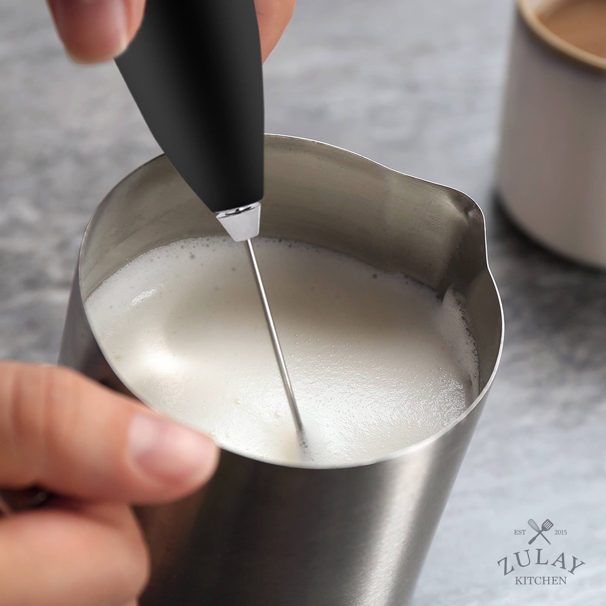Stainless steel frothing pitcher top-down view