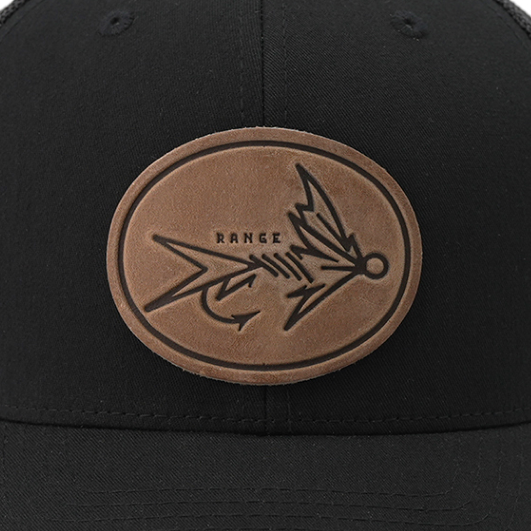 Range Fly Icon trucker cap leather patch close-up