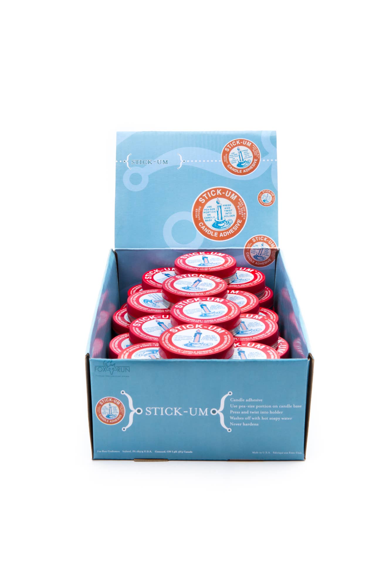 Stick-Um candle adhesive display showing product packaging