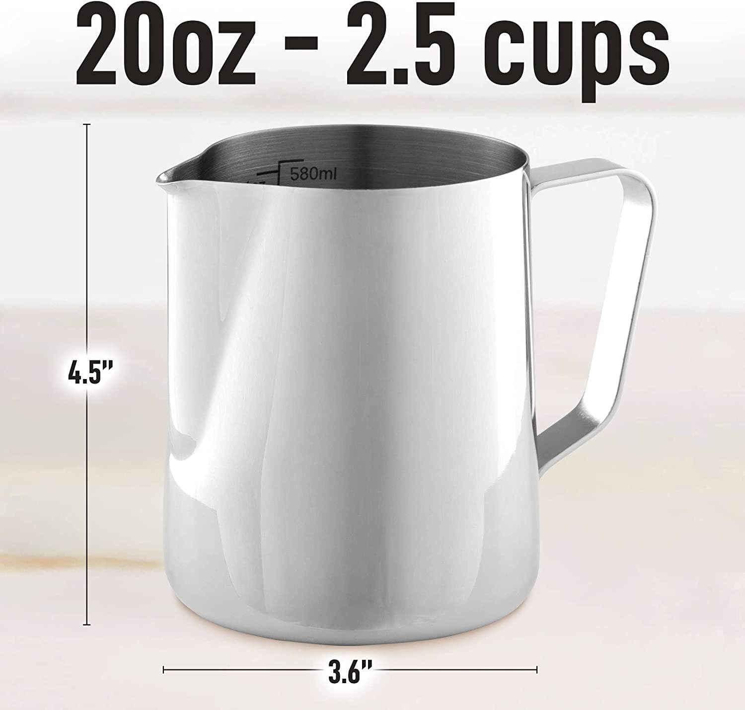 Stainless steel frothing pitcher showing interior measurements
