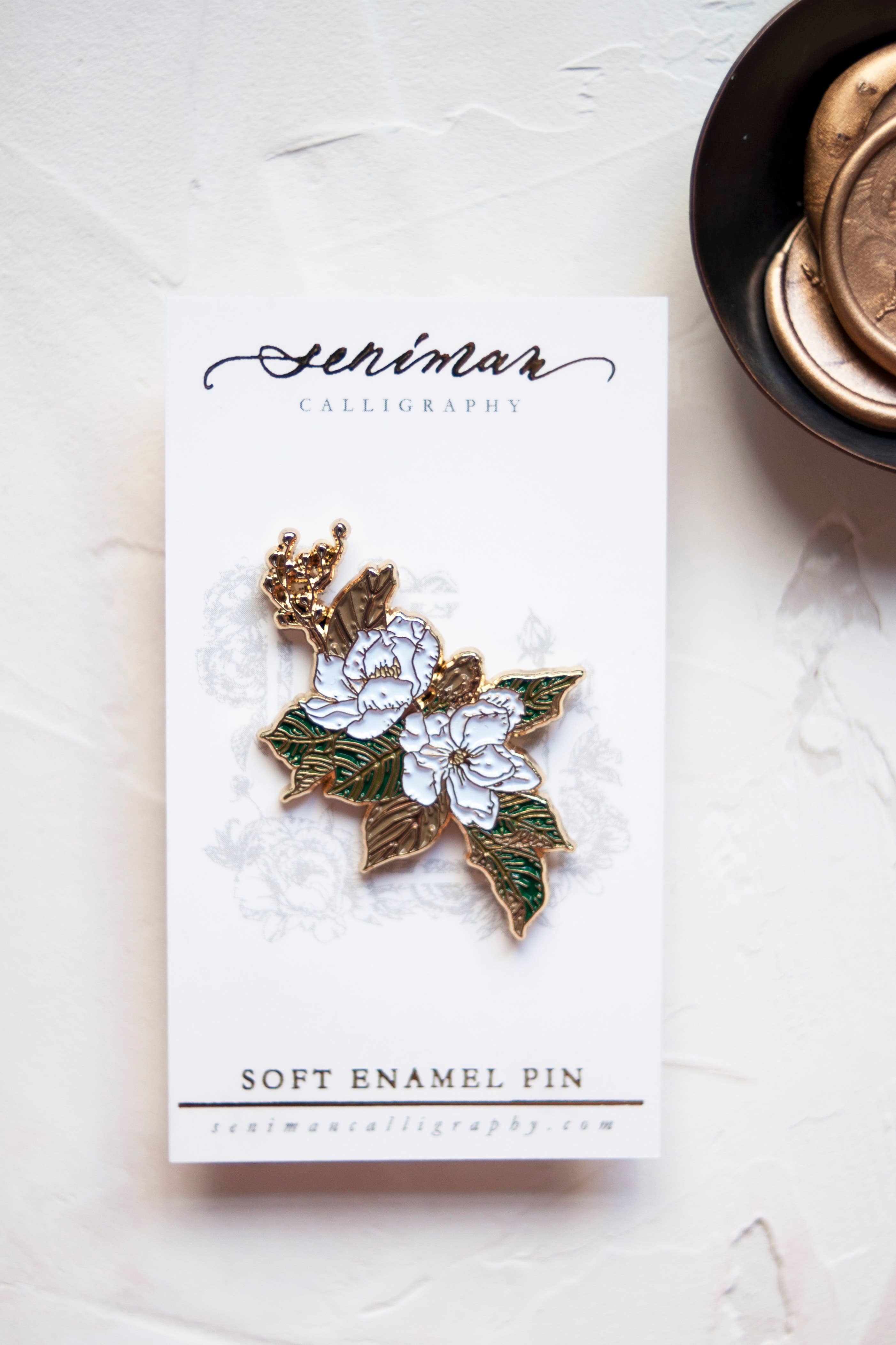 Southern Magnolia gold soft enamel pin on packaging card