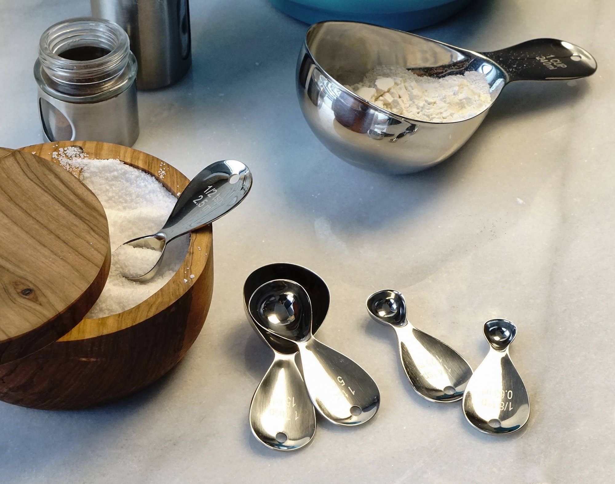 Teardrop measuring spoons close-up of engraved markings