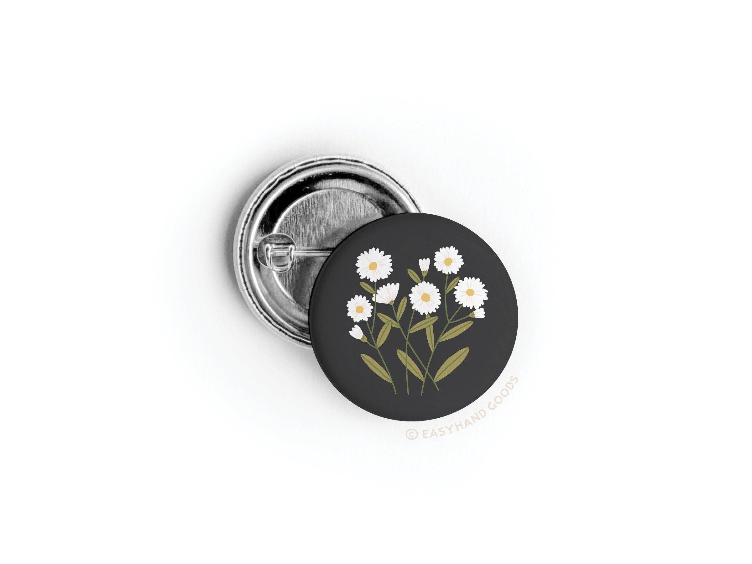 Daisies button displayed on packaging