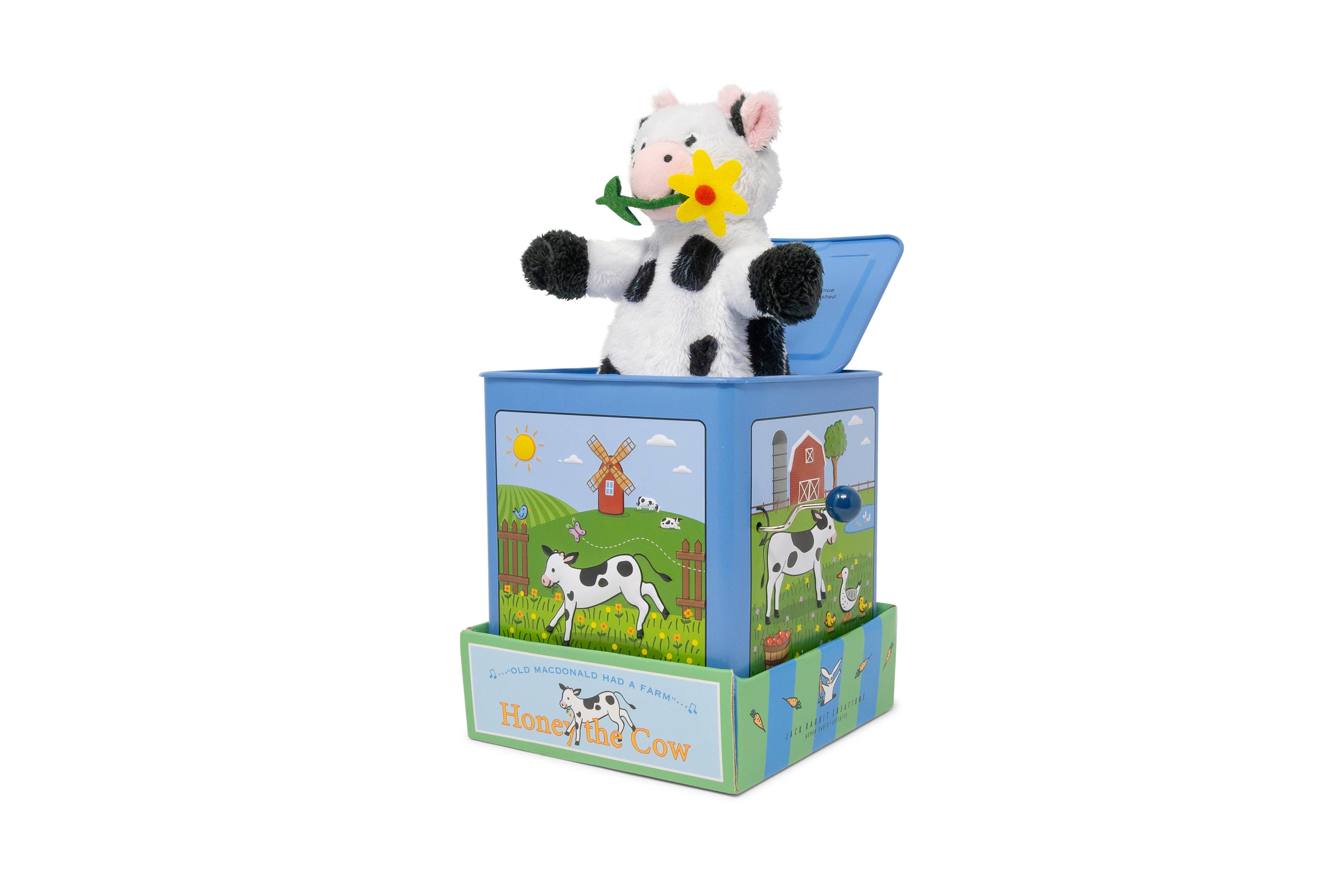 Honey the Cow Jack in the Box toy in packaging