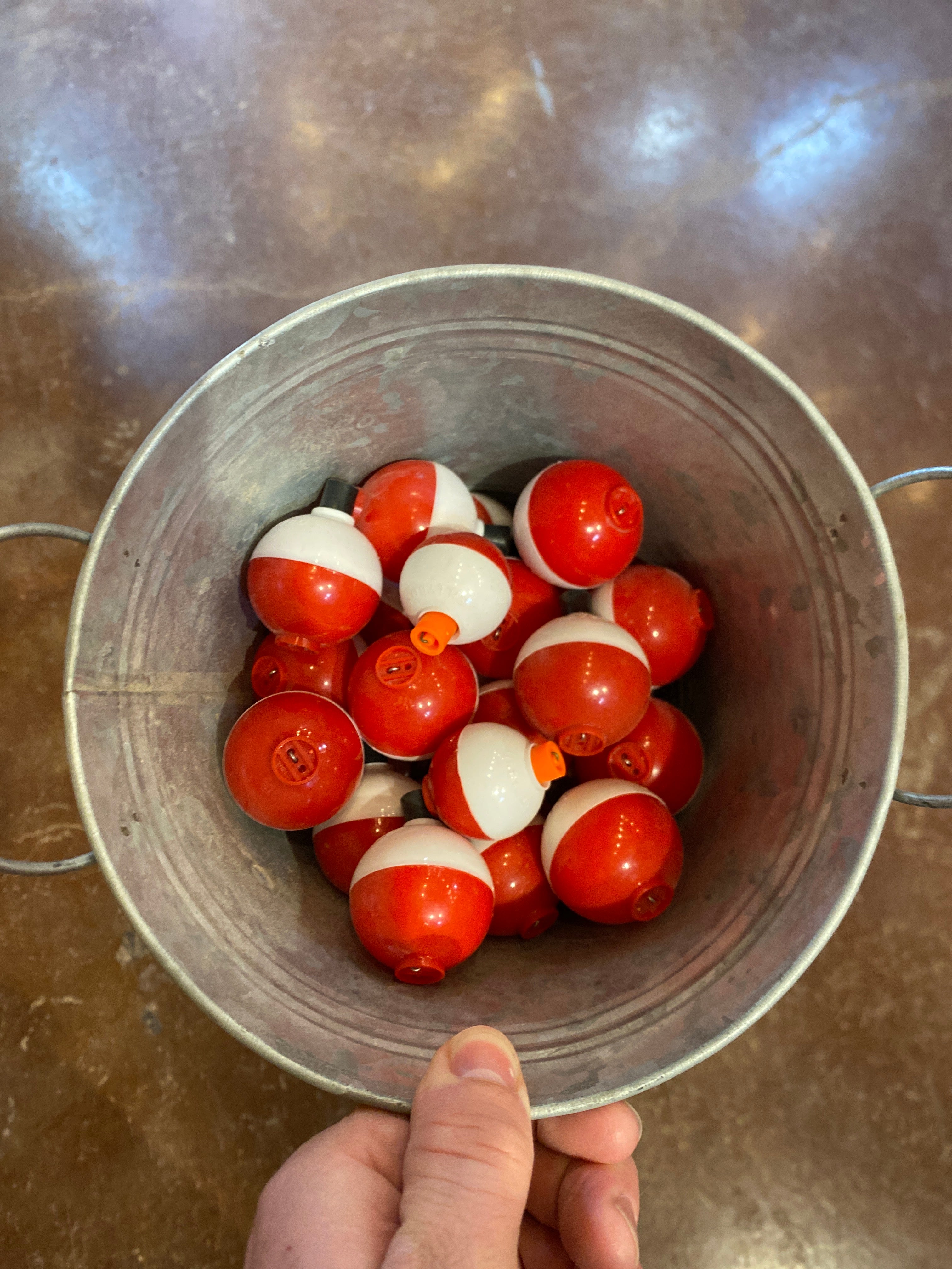 Red and white clip-on fishing bobbers