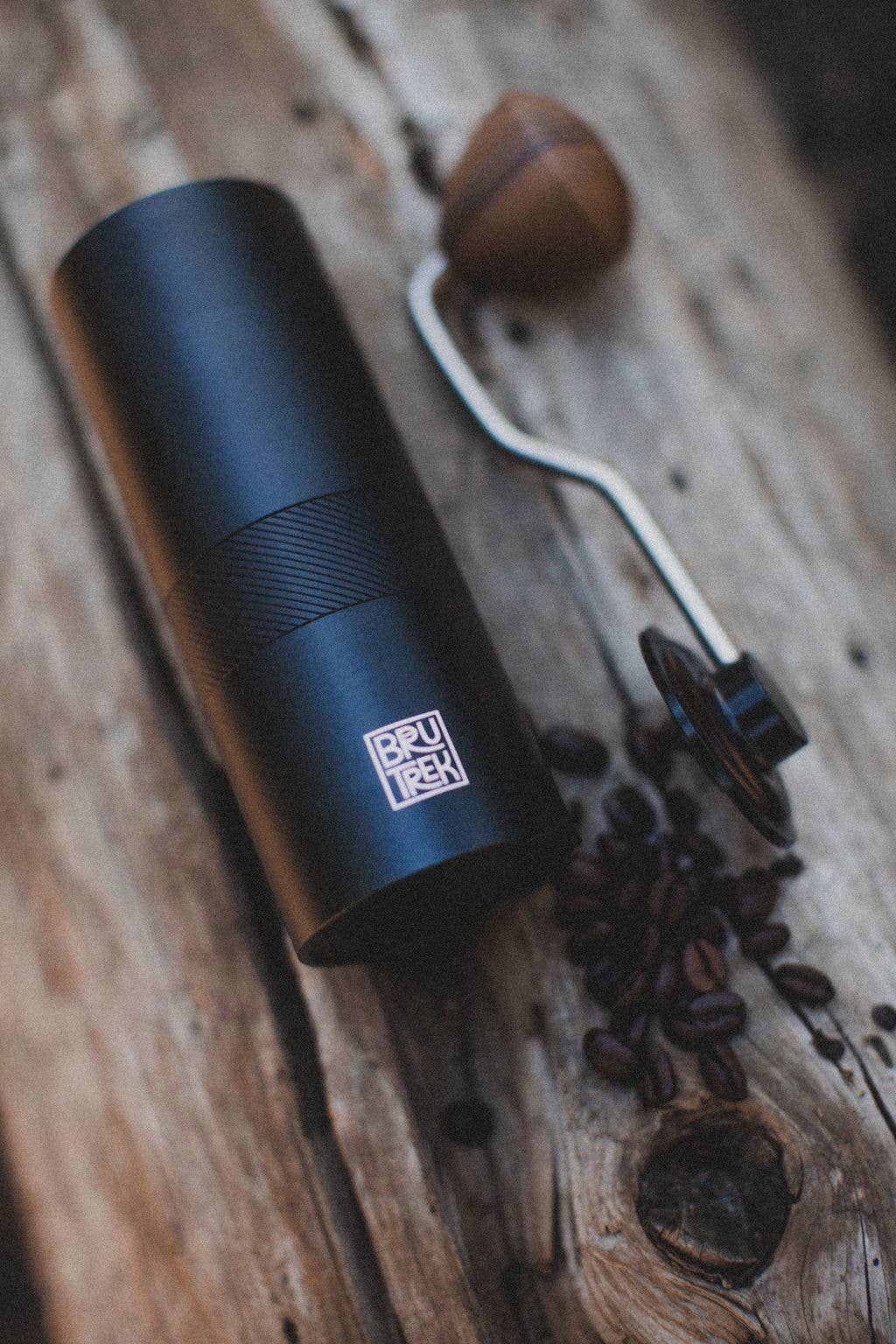BruTrek Camp Coffee Hand Grinder in use outdoors