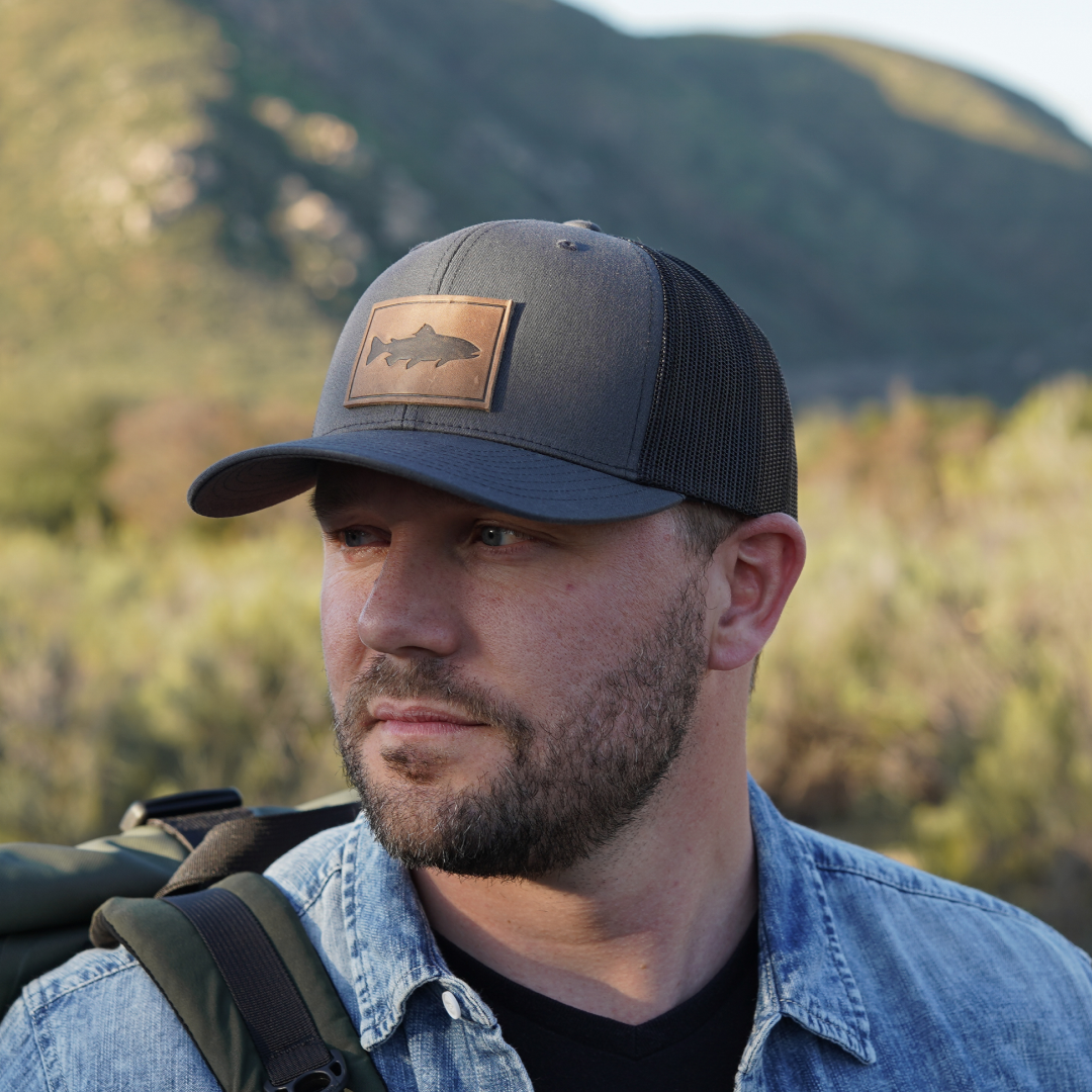 Trout leather patch trucker cap angled view