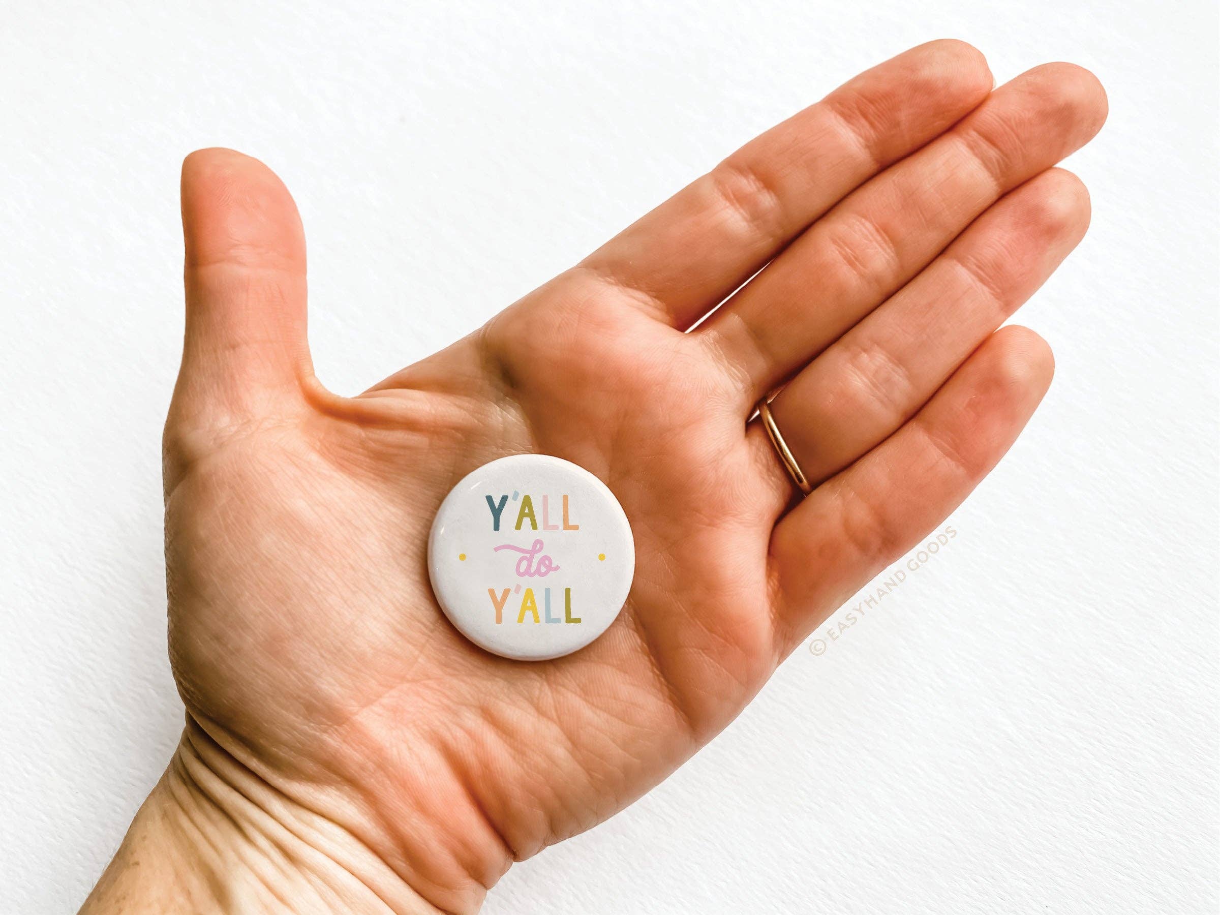 Y'all Do Y'all button pin on display