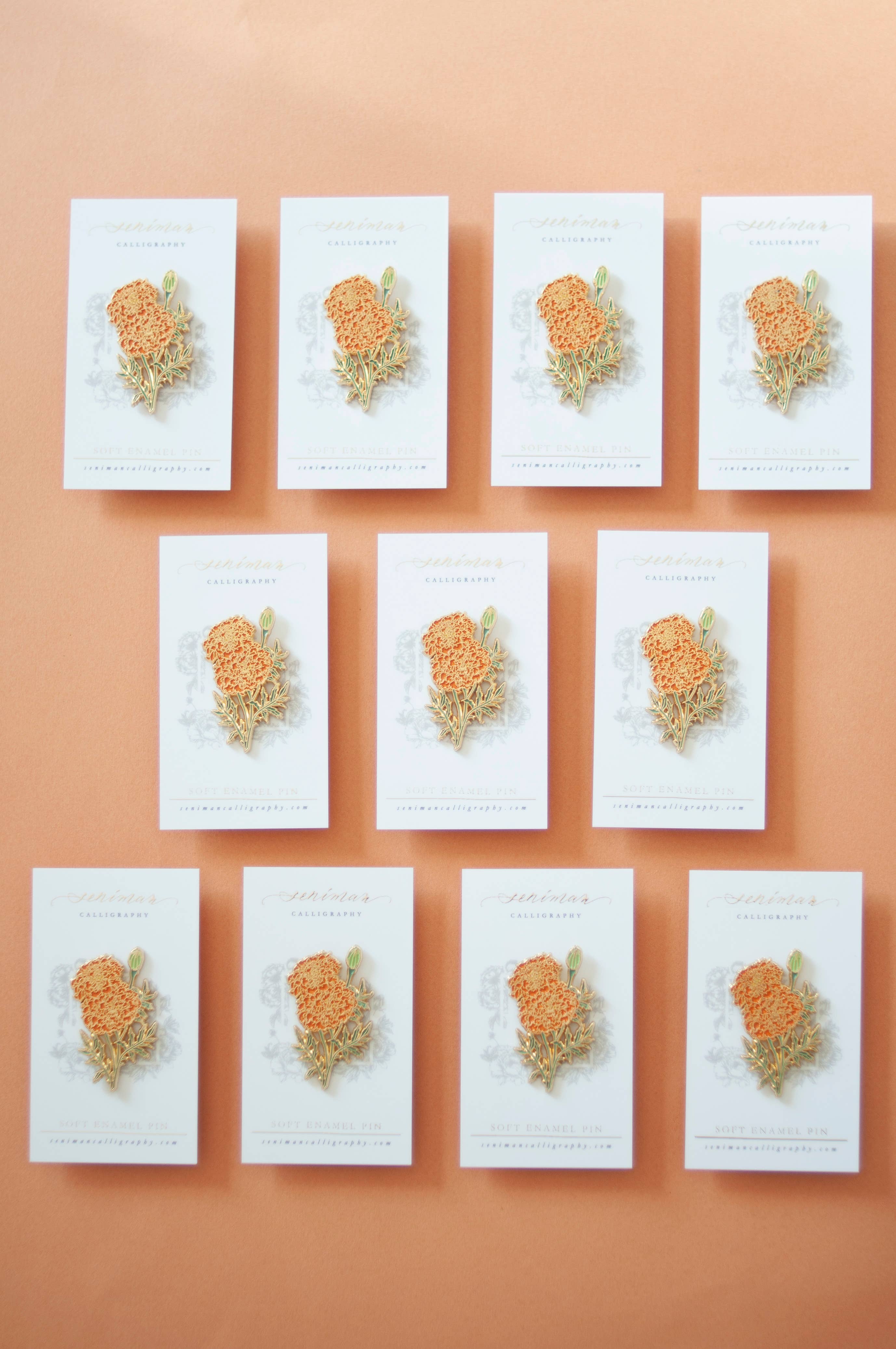 Marigold enamel pin close-up detail