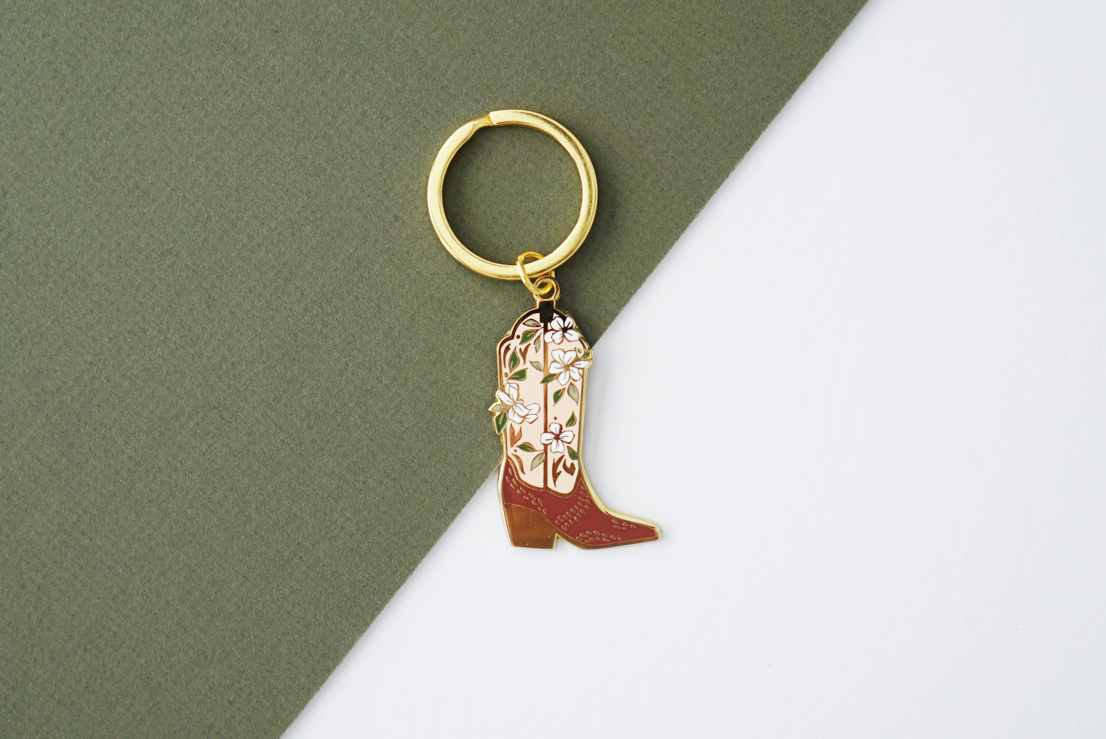Western cowboy boot gold enamel keychain detail view
