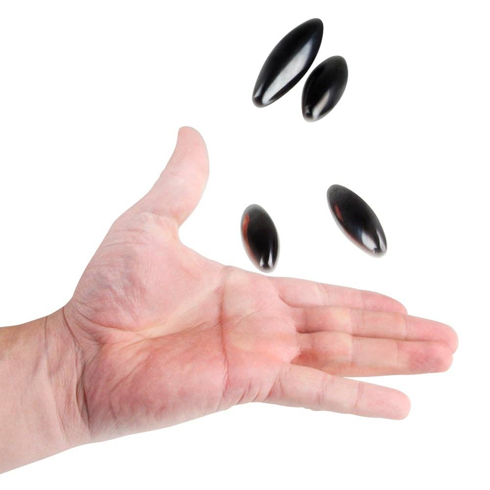 Pair of magnetic rattle snake eggs toy close-up