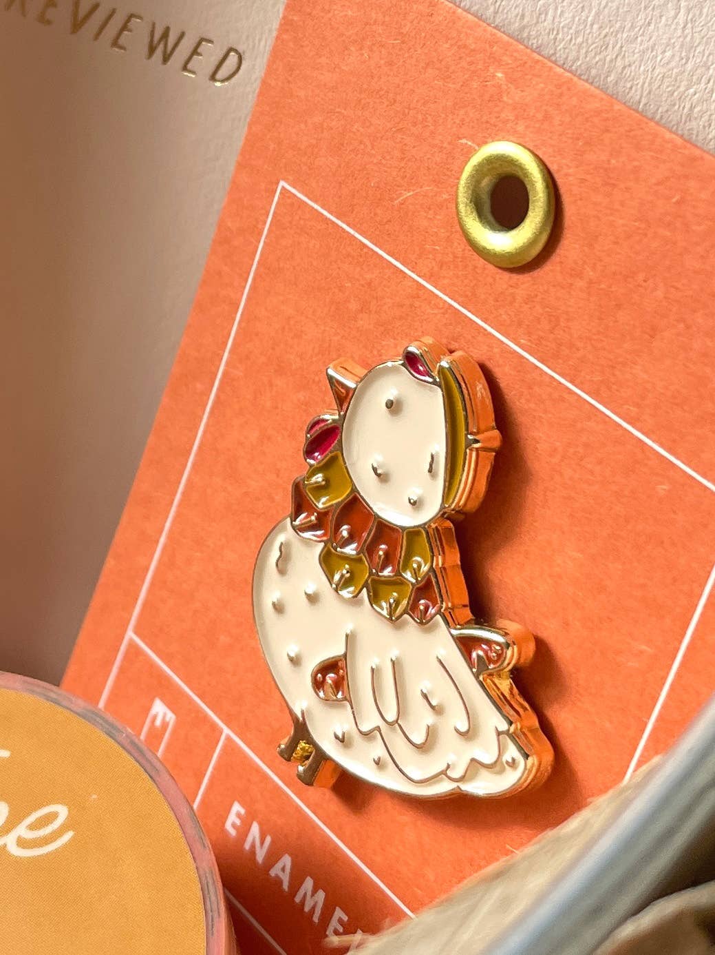 French Hen enamel pin close-up detail